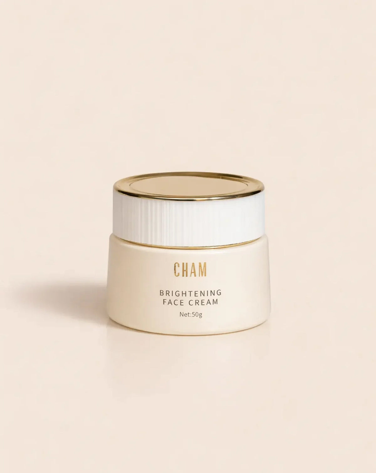 An open cream jar with its lid resting beside it